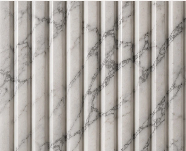 Braided leather and warm metal detailing against marble and oak